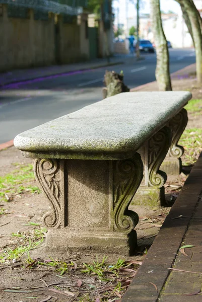 Very old concrete bench on the street of Guatemala City, municipal outdoor decoration, landscaping and space to relax.