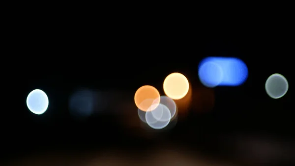 Koyu Arkaplanda Bulanık Turuncu Mavi Bokeh Işıkları — Stok fotoğraf