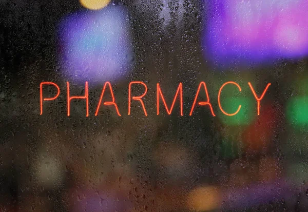 Neon Pharmacy Sign Wet Window Glass Night — Stock Photo, Image