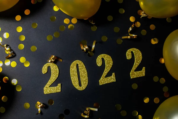 Closeup Shot Golden Confetti Balloons 2022 Digits Dark Surface New Stock Image