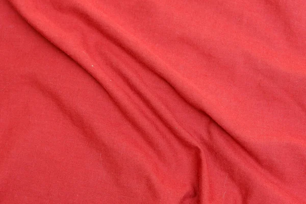 Eine Nahaufnahme Von Oben Einer Runzeligen Textur Aus Rotem Stoff — Stockfoto