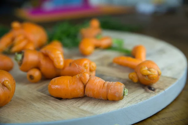 Look Funny Shaped Fresh Baby Carrots Wooden Table — Stock Photo, Image