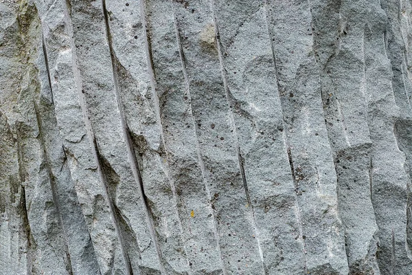 Een Ruwe Stenen Textuur Achtergrond Met Verticale Lijnen Gaten — Stockfoto