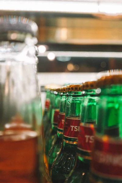 Closeup Shot Bottles Beer Table Pub — Stock Photo, Image