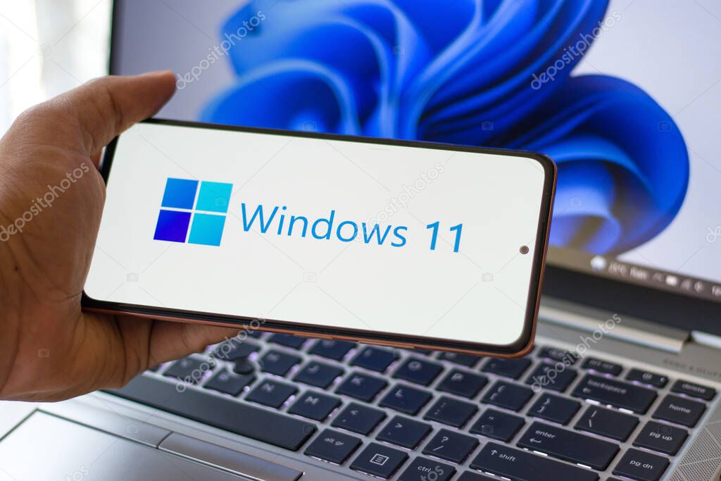DIBRUGARH, INDIA - Jun 25, 2021: Assam, india  June 17, 2021  Windows 11 logo on laptop screen stock image.