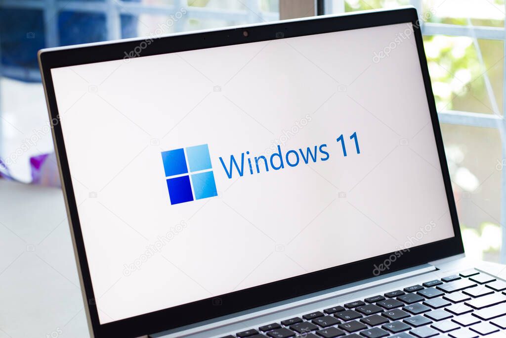 DIBRUGARH, INDIA - Jun 25, 2021: Assam, india  June 17, 2021  Windows 11 logo on laptop screen stock image.