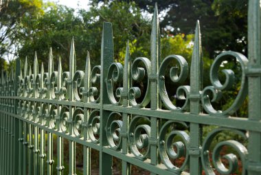 Old metal fence, private property protection in Guatemala City clipart