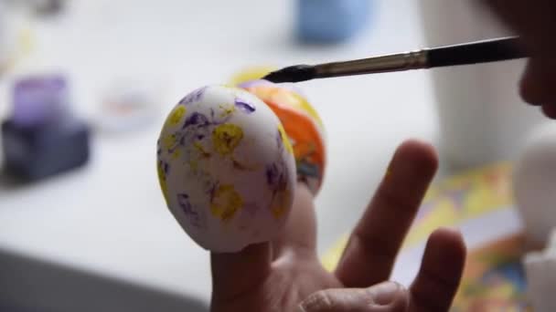 Close Hand Holding Toy Egg — стоковое видео
