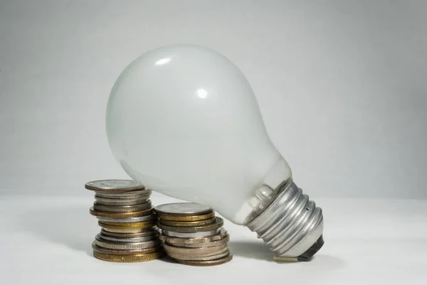 Old Lighting Bulb Home Group Coins Sign High Energy Consumption — Stock Photo, Image