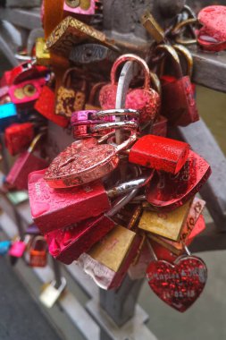 A vertical shot of the vibrant metal love locks at the N Seoul Tower in South Korea clipart