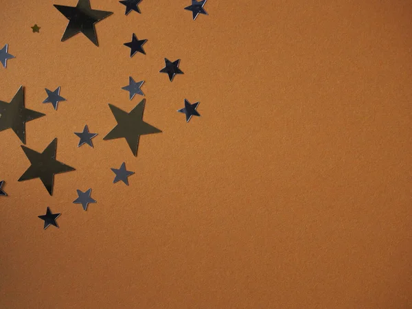 星とオレンジの紙の背景 — ストック写真