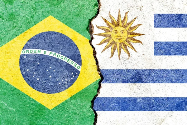 Primer Plano Las Banderas Brasil Uruguay Una Pared Rota —  Fotos de Stock