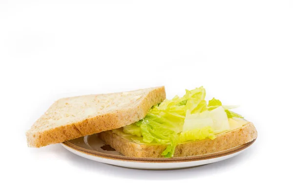 Eine Nahaufnahme Von Braunem Brotsandsack Mit Salat Und Käse Auf — Stockfoto