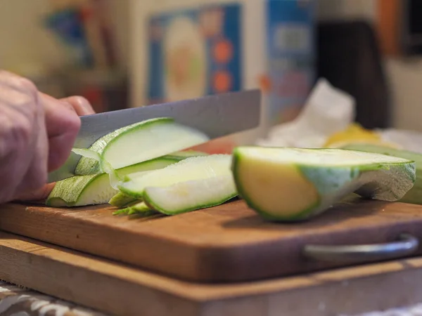 Senior Chef Cutting Organic Fresh Zucchini Wooden Board Sharp Knife — Zdjęcie stockowe