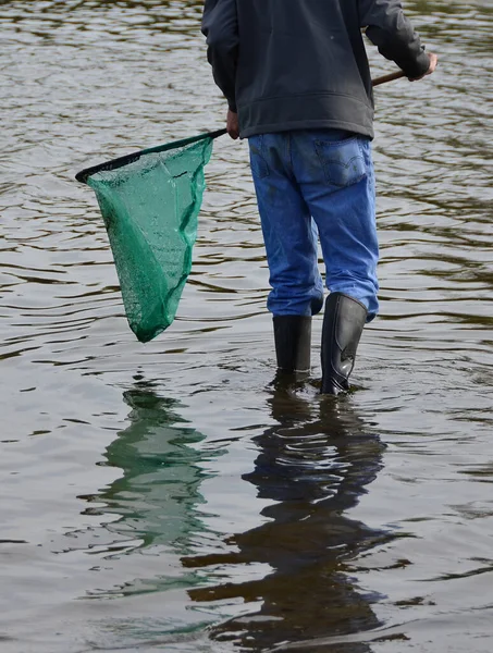 Vertical Shot Fisherman Boots Net Standing Edge Water — Stock Photo, Image