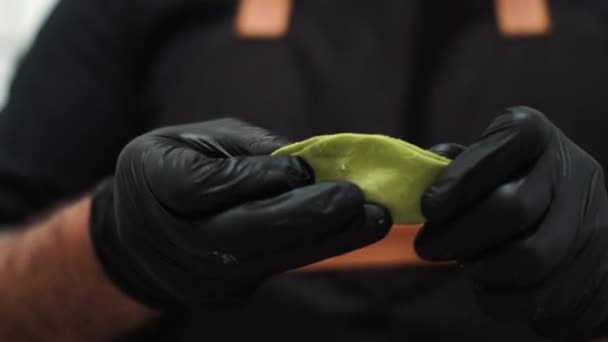 Close Man Hands Black Gloves Making Dumplings — стоковое видео