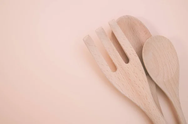 Closeup Shot Wooden Spoons Fork Isolated Pink Background — Stock Photo, Image