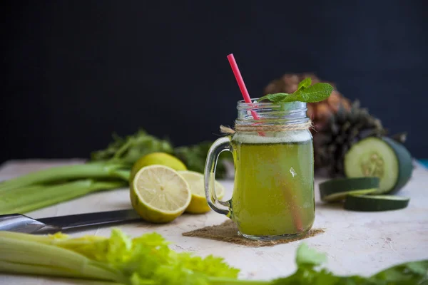 Glass Green Citrus Lemonade Red Stick Surrounded Lime Lemon Cucumber — Stock Photo, Image