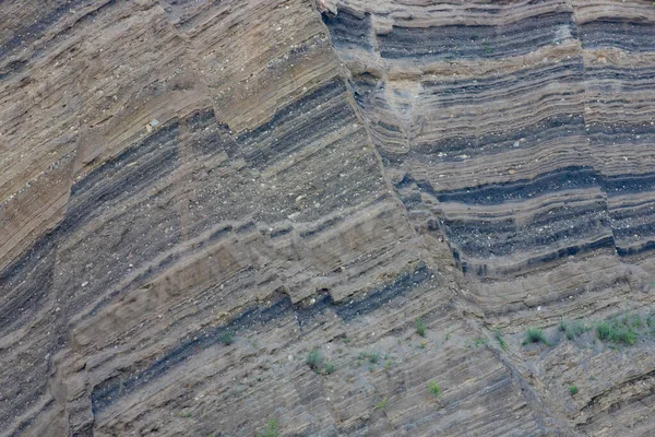 Nahaufnahme Verschiedener Gesteinsschichten Einer Felswand — Stockfoto