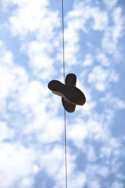 Low Angle Shot Shoes Handing Laundry Line — 图库照片