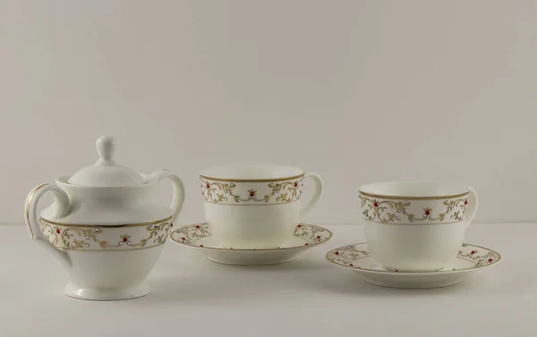 Eine Nahaufnahme Von Aufwändig Gefertigten Keramik Teetassen Und Einem Topf — Stockfoto