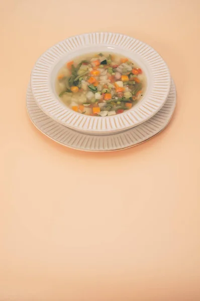 Vertical Shot Vegetable Soup Bowl Isolated Light Orange Background — Stock Photo, Image