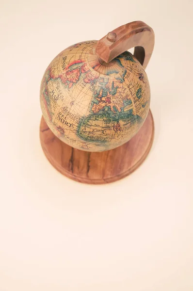 Vertical Shot Small Wooden Globe Isolated Pink Background — Stock Photo, Image