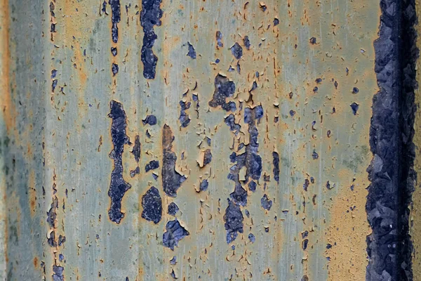 Ένα Κοντινό Πλάνο Μιας Πολύχρωμης Πλυμμένης Πόρτας Μπλε Και Μπεζ — Φωτογραφία Αρχείου