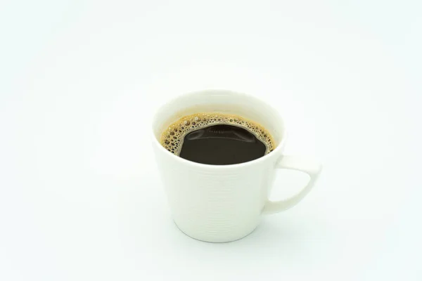 Uma Xícara Café Escuro Uma Superfície Branca — Fotografia de Stock