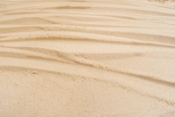 ビーチでの砂のテクスチャのクローズアップショット — ストック写真