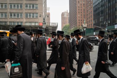 NEW YORK, UNITED STATES - Jul 21, 2021: Ultra-Orthodox Jews protest against Israeli government policies outside the Israeli consulate in New York City. clipart