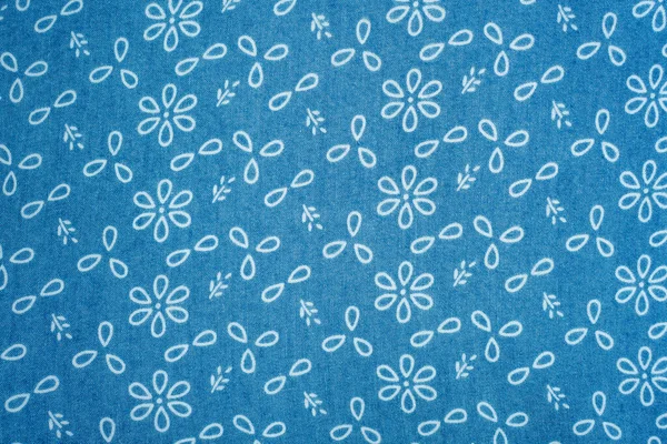 Closeup White Flower Designs Blue Fabric — Stock Photo, Image