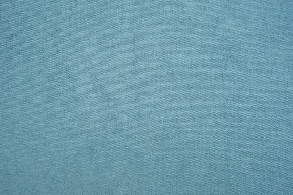 壁紙や背景に使われる青い布壁のクローズアップ — ストック写真