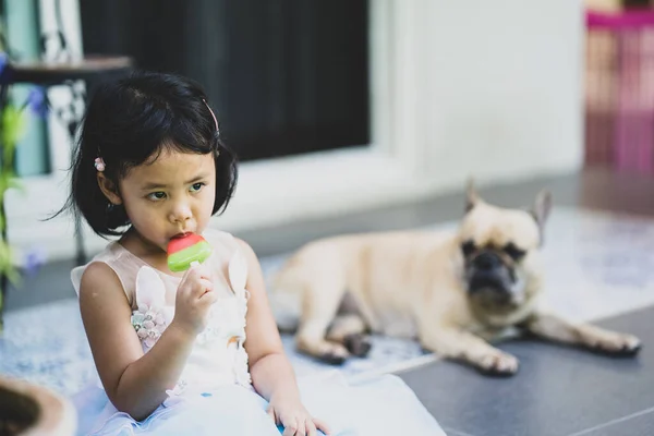 Cute Asian Small Girl Sitting Floor Eating Lollipop — Stock Photo, Image