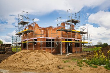 A closeup shot of a house under construction in Germany clipart