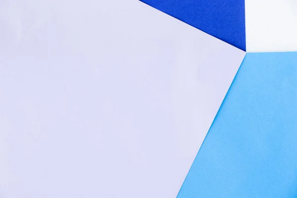 白い背景に異なる色の紙のフラットレイアウト — ストック写真