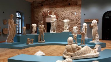 CRACOW, POLAND - Apr 24, 2021: Ancient Greek and Roman marble sculptures in Czartoryski Princes Collection at National Museum. clipart