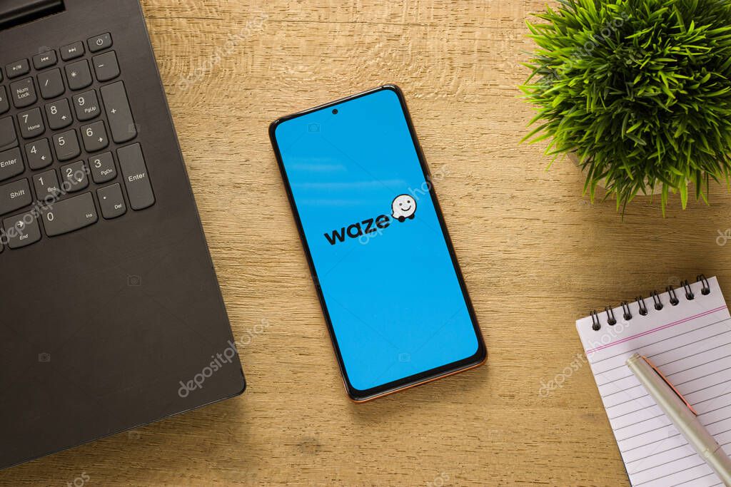DIBRUGARH, INDIA - May 26, 2021: Assam, india  May 29, 2021  Waze logo on phone screen stock image.