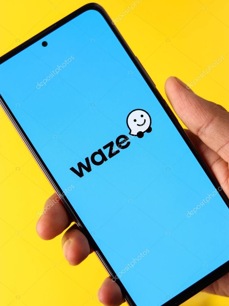 DIBRUGARH, INDIA - May 26, 2021: Assam, india  May 29, 2021  Waze logo on phone screen stock image.