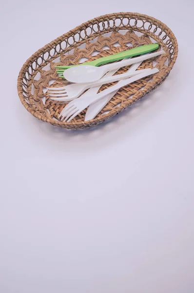 Vertical Shot Plastic Fork Spoon Wicker Basket Isolated Light Gray — Stock Photo, Image