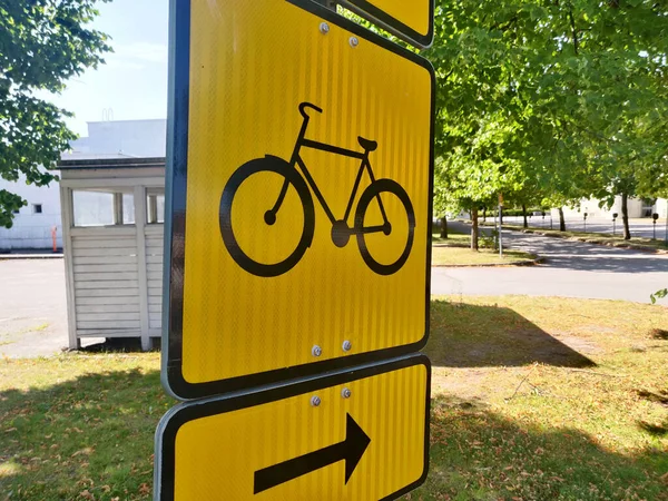 Closeup Shot Big Yellow Street Sign Bicycle Arrow Showing Direction — Stock Photo, Image