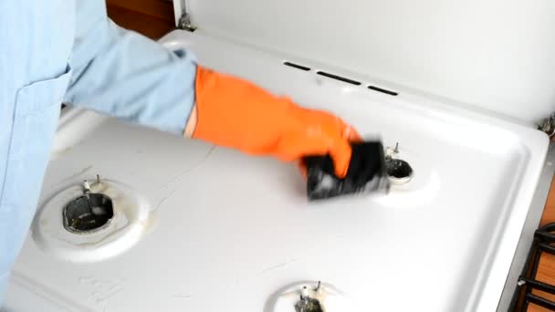 Person Cleaning Gas Stove — Stock Video