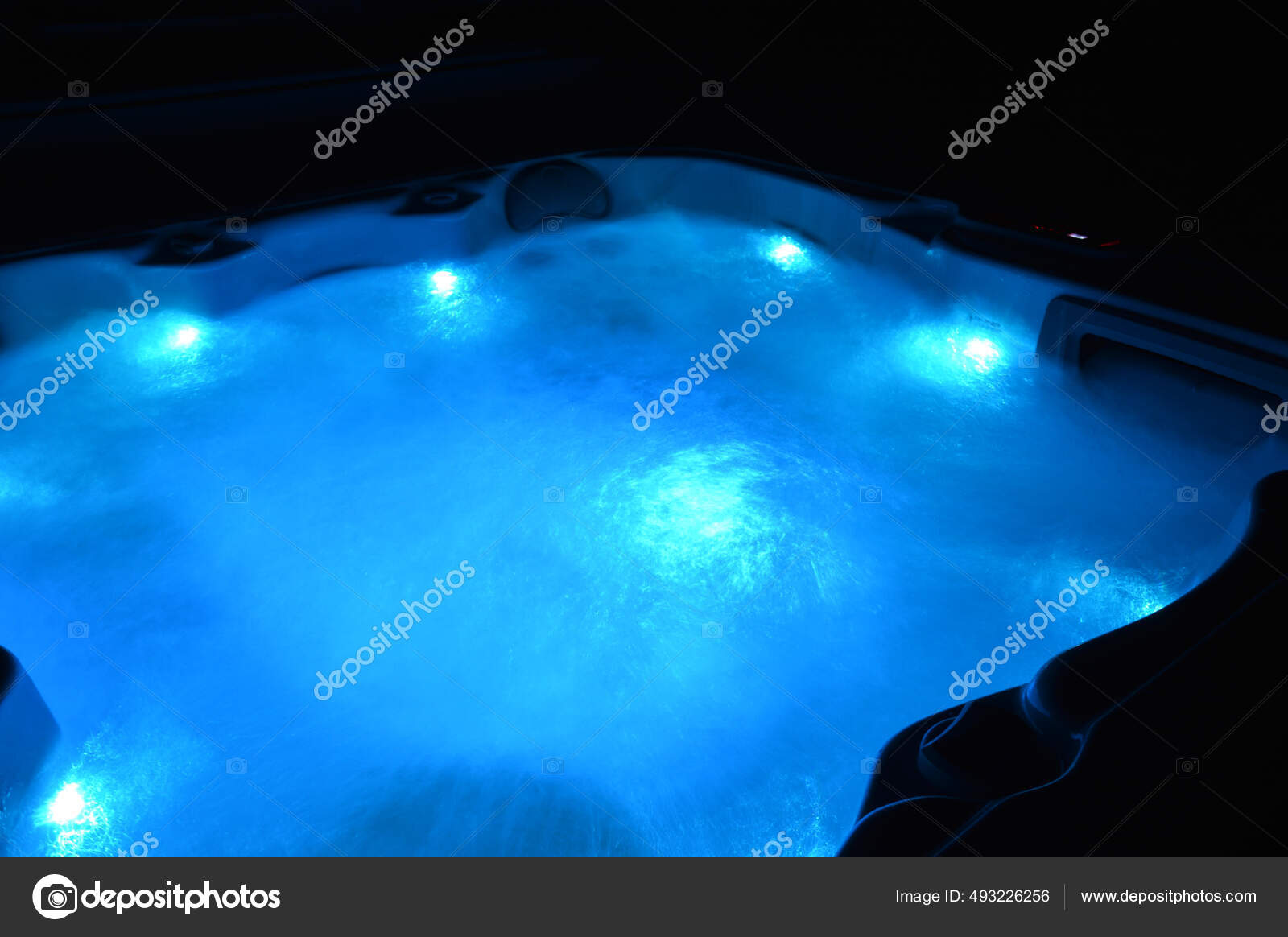 Jacuzzi Illuminated Blue Light Night Stock Photo by ©Wirestock 493226256