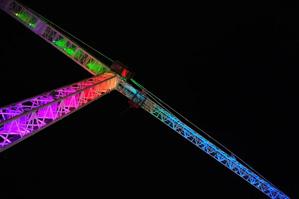 Low Angle Shot Construction Crane Colorful Lights Black Sky — Stock Photo, Image