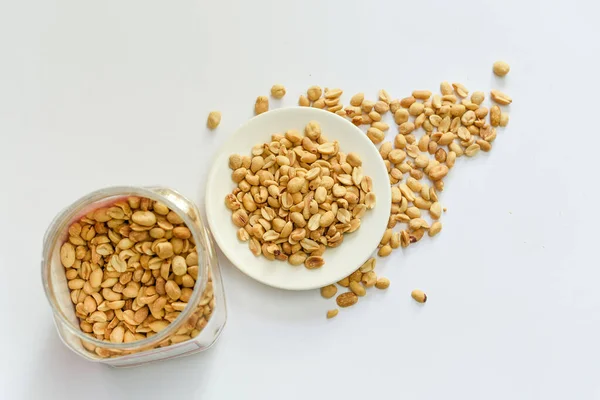 Uma Vista Superior Amendoins Uma Chapa Redor — Fotografia de Stock
