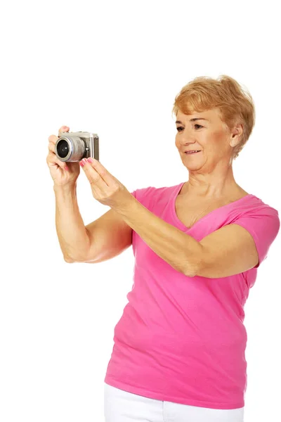 Portrait Old Polish Woman Taking Photo Her Vintage Camera Isolated — Zdjęcie stockowe