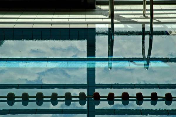 Closeup Shot Indoor Swimming Pool Lane Clear Water Metallic Ladder — Stock Photo, Image