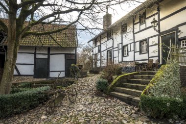 SCHWEIBERG, NETHERLANDS - Jan 19, 2018: A half-timbered framed house in the town of Schweinsberg, South Limburg, Netherlands clipart