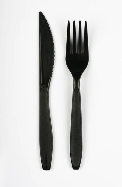 Top View Closeup Black Plastic Fork Knife Placed White Background — Stock Photo, Image