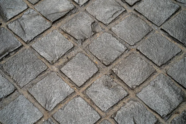 Ein Alter Pflasterbeton Mit Quadratischen Mustern Auf Der Straße — Stockfoto